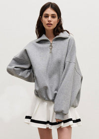 Rhea | Maglione a mezza zip dal taglio rilassato